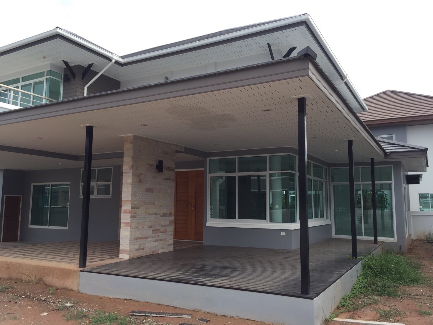 Covered terrace and exterior windows at HK-0002
